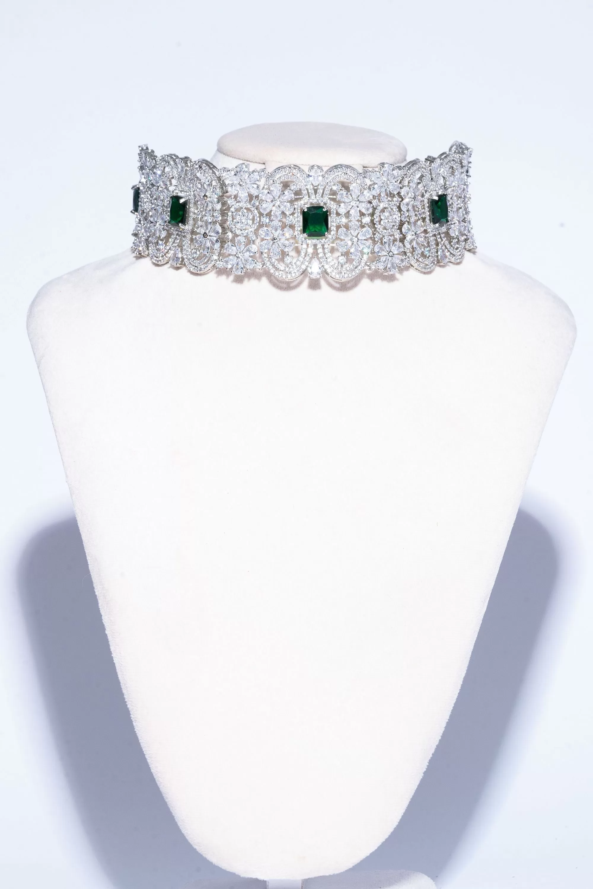 Cerise White Gold and Emerald Choker and Jhumka Earring Set By Jaipur Rose Designer Modern Indian Jewelry