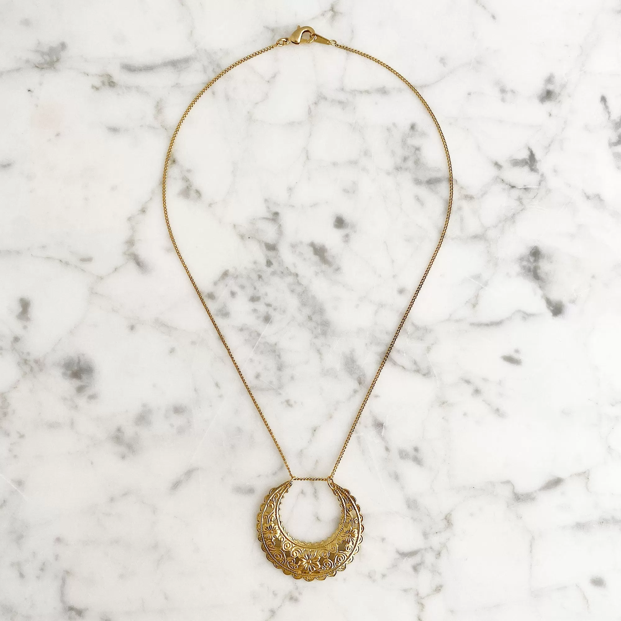 DANBY gold half moon pendant