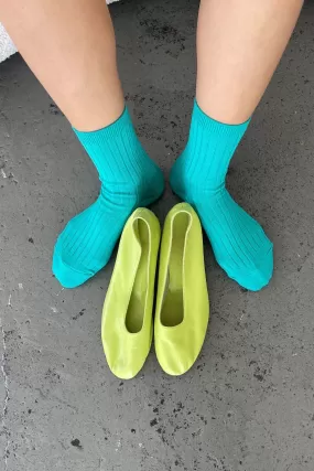 Her Socks in Turquoise