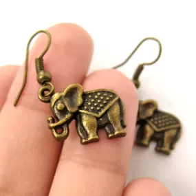 Small Elephant Shaped Dangle Earrings in Brass with Textured Detail | DOTOLY