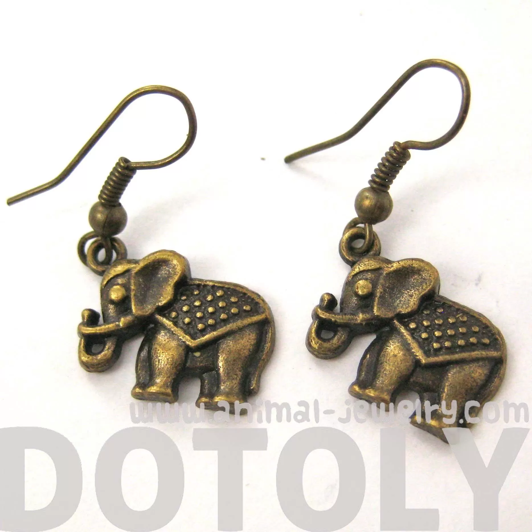 Small Elephant Shaped Dangle Earrings in Brass with Textured Detail | DOTOLY